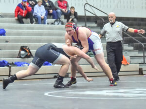 Preston wrestling team battles back to defeat Morgantown